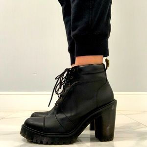 Dr. Martens high heel black boots.